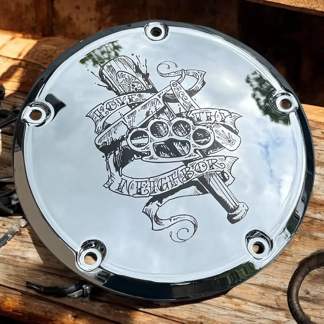 Chrome Harley-Davidson derby cover with detailed custom engraving