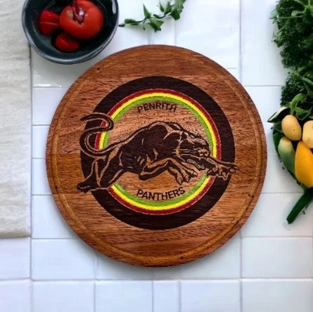 Round wooden serving board featuring a Penrith Panthers design