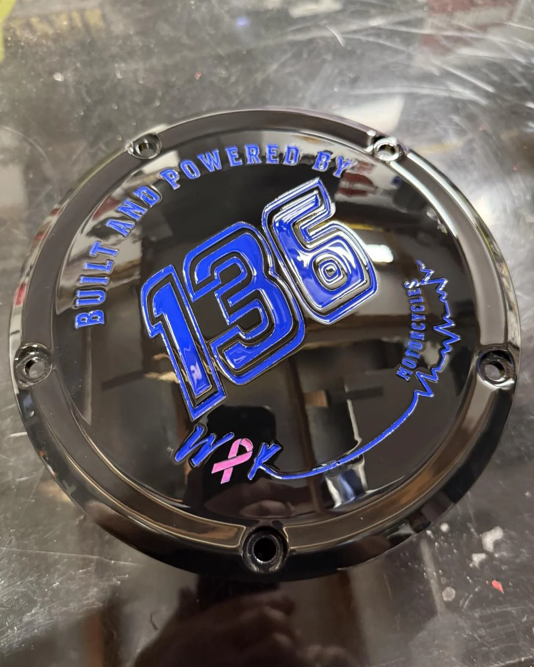 Chrome M8 timing cover with blue 136 custom lettering