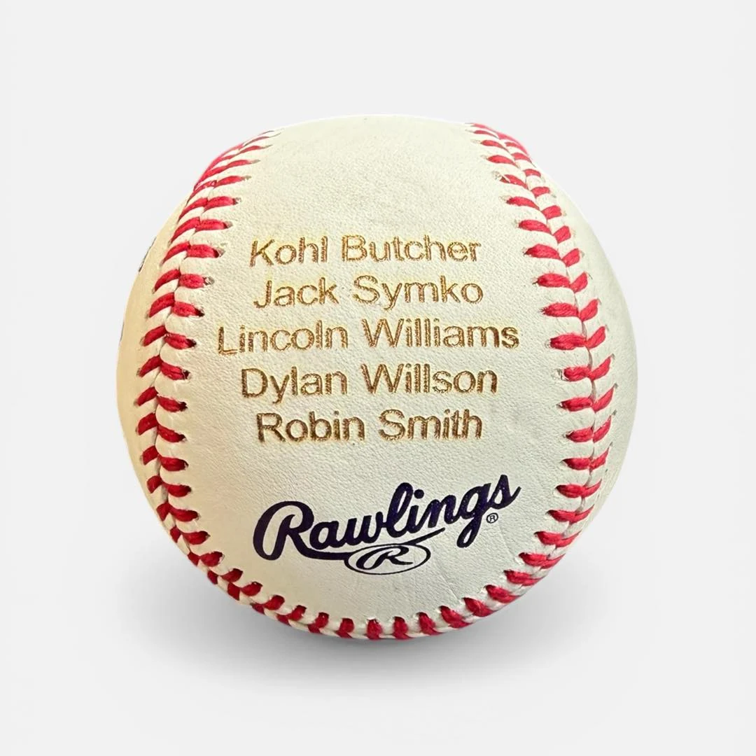 White baseball engraved with a list of player names